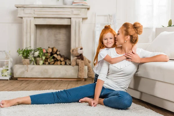 Daughter hugging mother — Stock Photo