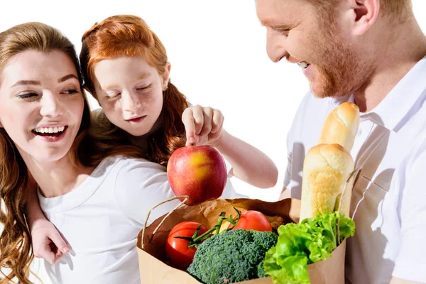 Familia feliz con bolsa de comestibles - foto de stock