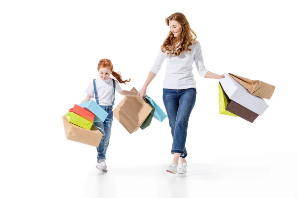 Mère et fille avec des sacs à provisions — Photo de stock