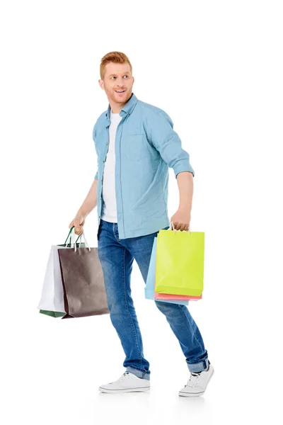 Young man with shopping bags — Stock Photo