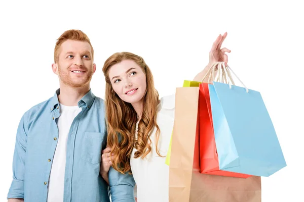 Pareja sosteniendo bolsas de compras - foto de stock