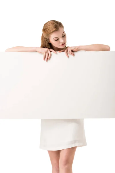 Woman holding blank placard — Stock Photo