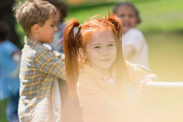 Children playing tug of war — Stock Photo