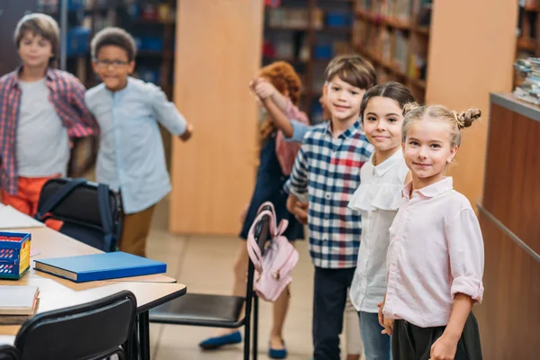 Little kids in library — Stock Photo