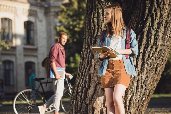 Student girl reading homework — Stock Photo