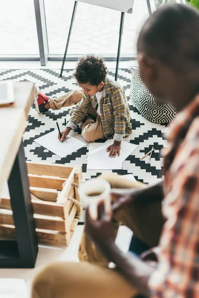 African american father and son in office — Stock Photo