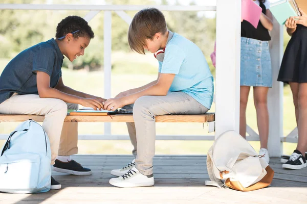 Multiethnic boys studying together — Stock Photo