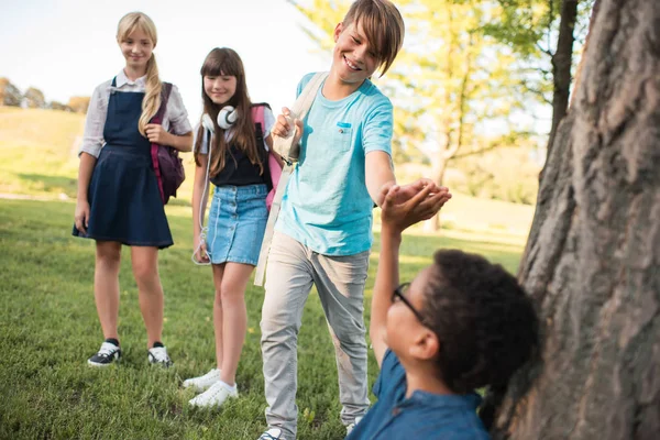 Multiethnic teenagers in park — Stock Photo