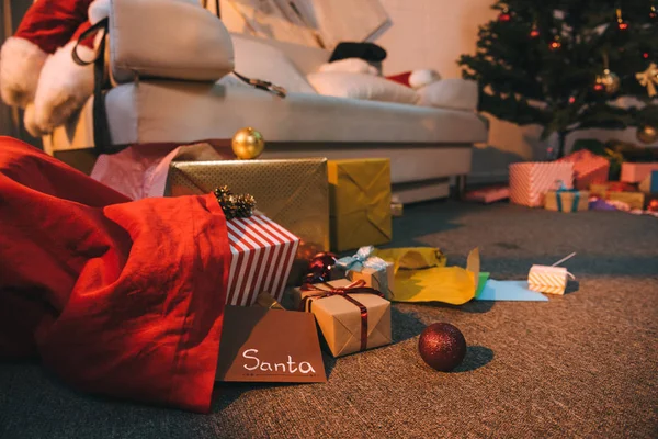 Christmas gifts in bag — Stock Photo