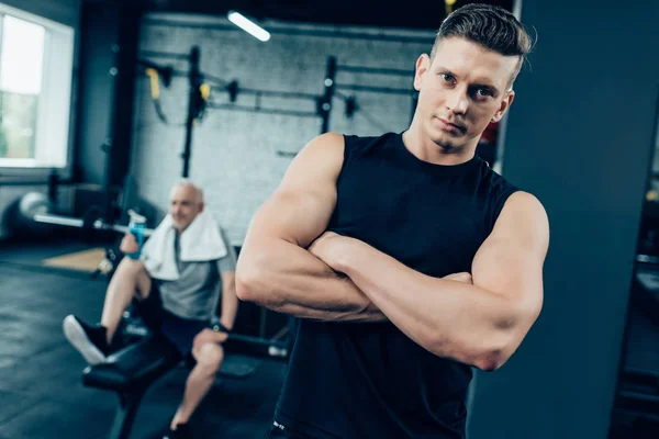 Sportsman with crossed arms — Stock Photo