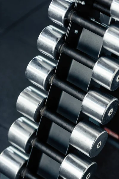 Row of dumbbells in gym — Stock Photo