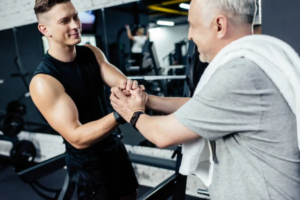 Senior Sportler und Trainer — Stockfoto