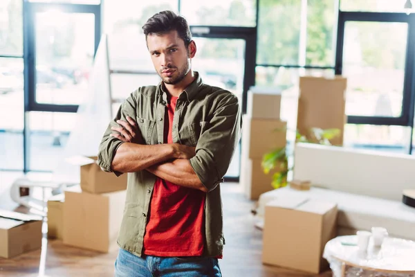 Handsome man in new house — Stock Photo