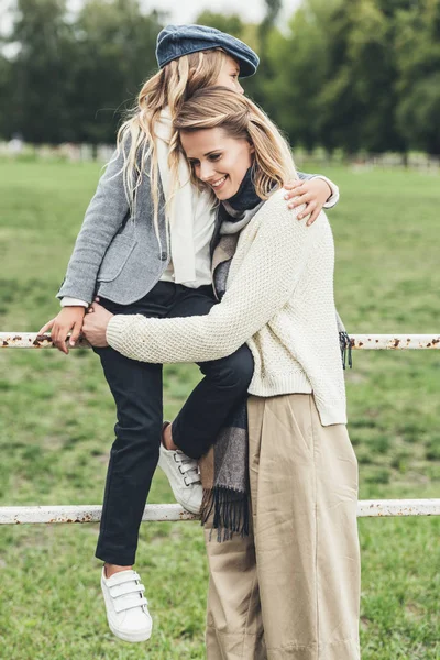 Mother and daughter at countryside — Stock Photo