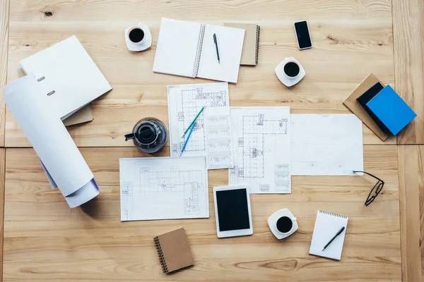 Digital tablet with papers and coffee — Stock Photo