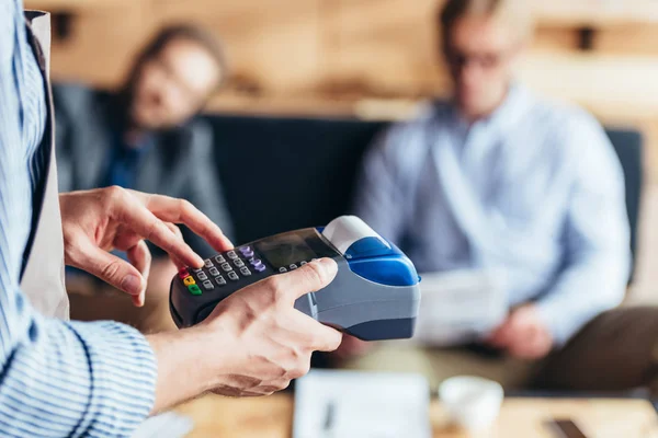 Person using payment terminal — Stock Photo