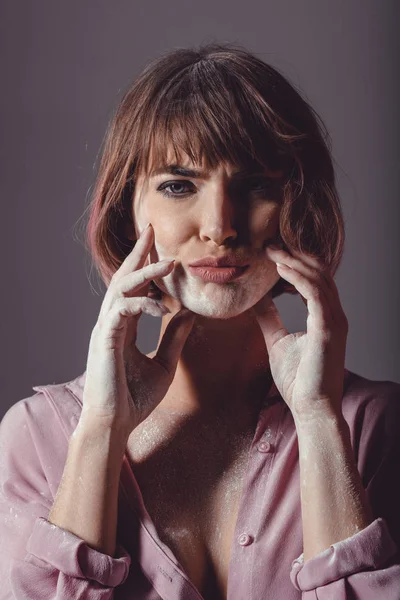 Girl with powder on hands — Stock Photo