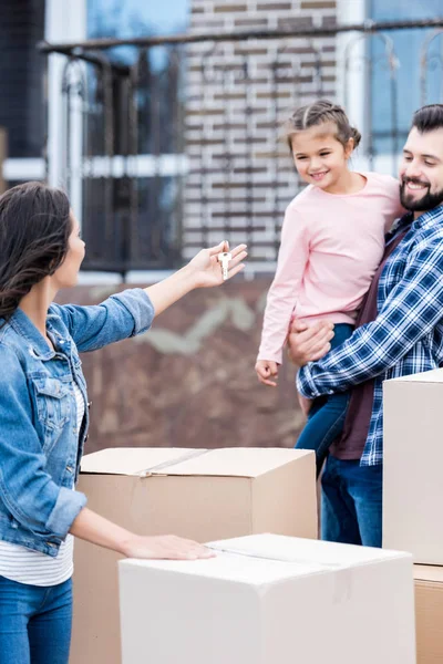 Family moving into new house — Stock Photo