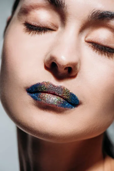 Young woman with glitter lips — Stock Photo