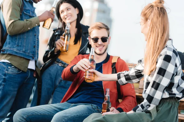 Multicultural friends with drinks — Stock Photo