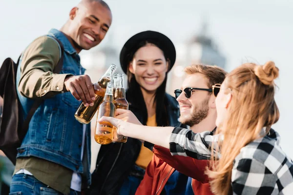 Multicultural friends with drinks — Stock Photo