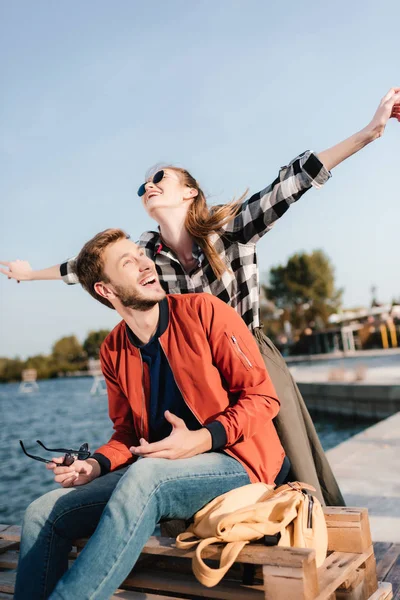 Happy couple on pier — Stock Photo