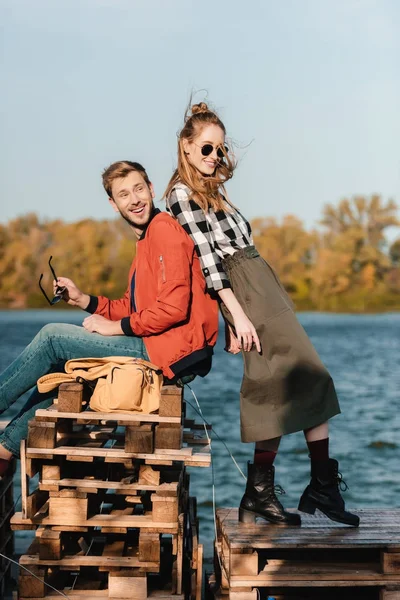 Happy couple on pier — Stock Photo