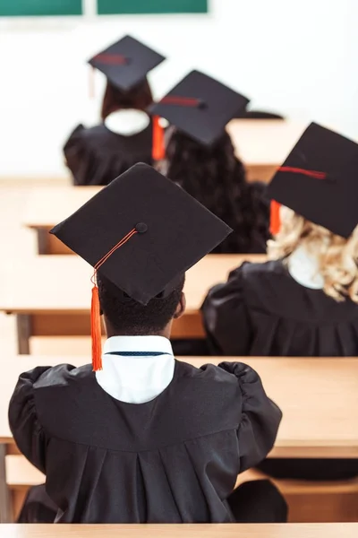 Students in graduation hats — Stock Photo