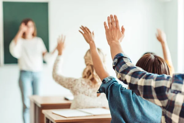 Raising hands — Stock Photo