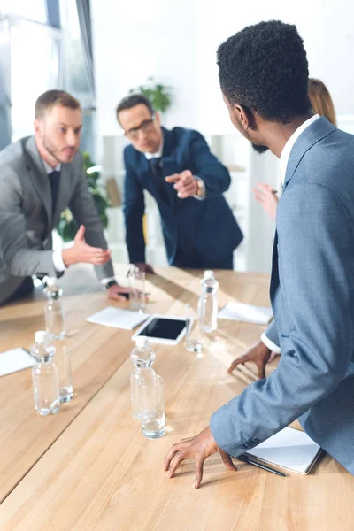 Businesspeople having conversation — Stock Photo