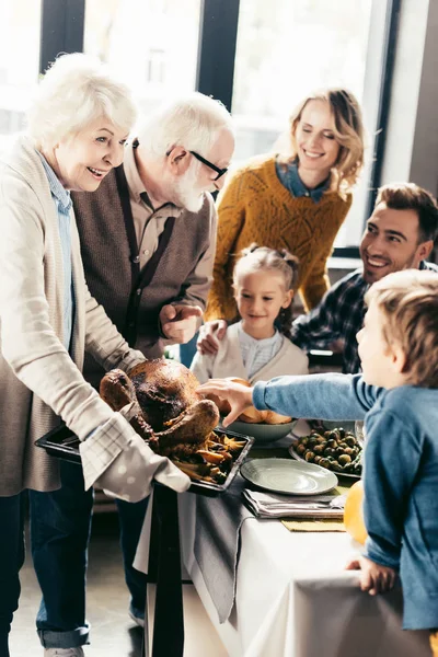 Family having holiday dinner — Stock Photo