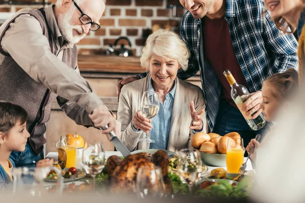 Family having holiday dinner — Stock Photo
