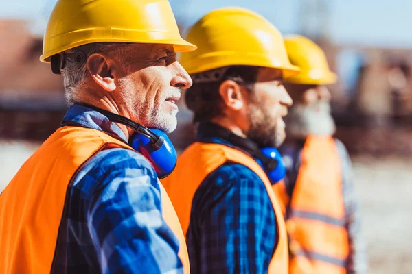 Workers at construction site — Stock Photo