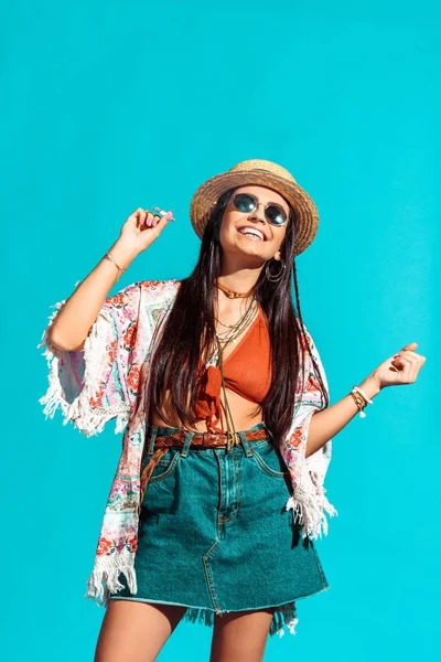 Hippie girl smoking cigarette and dancing — Stock Photo