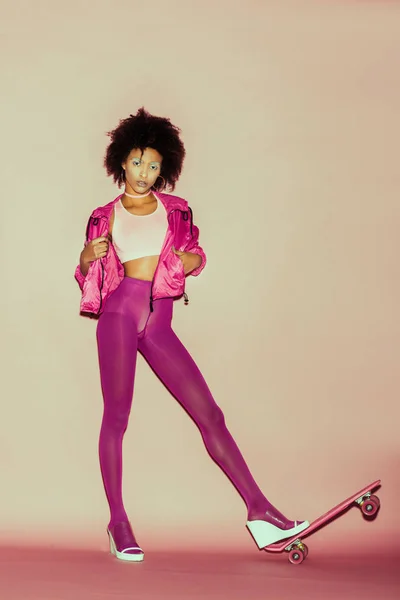 80s girl with penny board — Stock Photo
