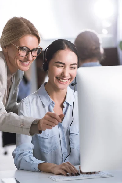 Smiling multicultural businesswomen — Stock Photo