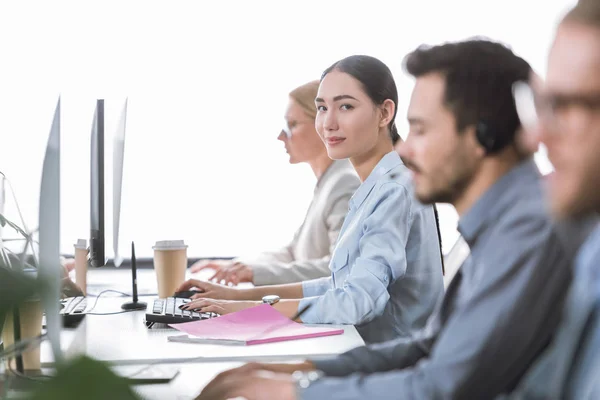 Asian call center operator — Stock Photo