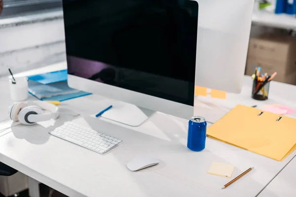 Modern computer with blank screen at workplace in office — Stock Photo