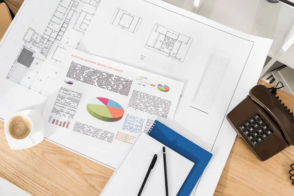 Top view of blueprints and plans on wooden table — Stock Photo