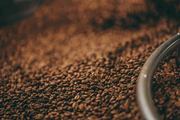 Selective focus of coffee beans roasting process — Stock Photo