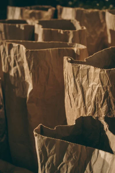 Selective focus of arranged paper bags — Stock Photo