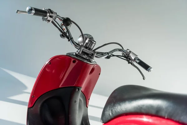 Close up view of red vintage scooter in studio — Stock Photo