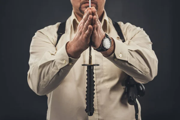 Cropped shot of yakuza member holding blade of tanto knife — Stock Photo