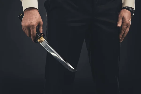 Cropped shot of yakuza member with tanto knife — Stock Photo