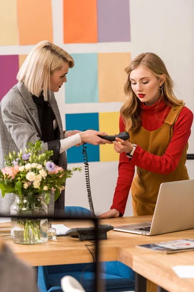 Fashionable businesswomen working in modern office — Stock Photo