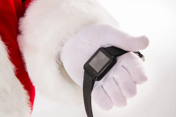 Santa Claus strony Wyświetlono smart zegarek — Zdjęcie stockowe