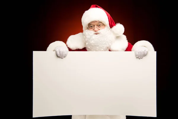Santa Claus mostrando plantilla de Navidad — Stock Photo