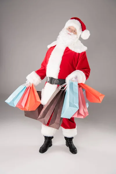 Papai Noel com sacos de compras — Fotografia de Stock