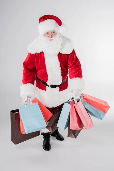 Papai Noel com sacos de compras — Fotografia de Stock