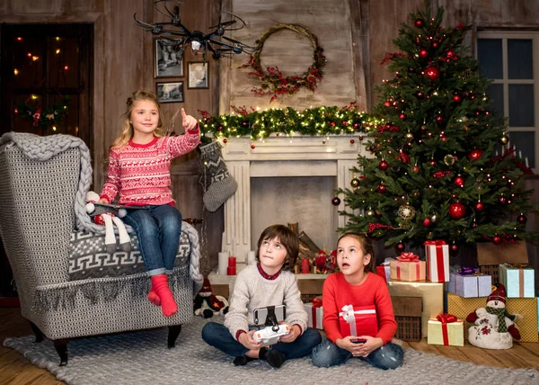 Children using hexacopter drone — Stock Photo